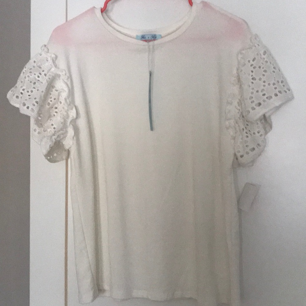 White summer top with lace ruffles